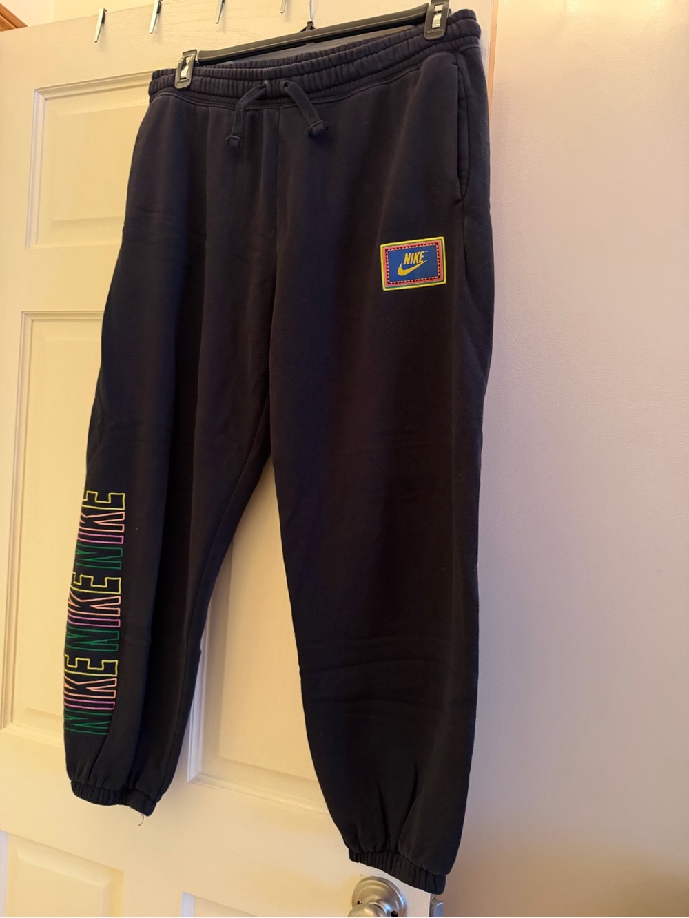 Nike Black Track Joggers with Multicolor Logo Detail